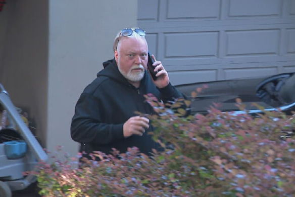 Kyle Sandilands outside his home in Sydney on Thursday.