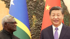 Close ties. Solomon Islands Prime Minister Manasseh Sogavare pictured with Chinese President Xi Jinping last year.