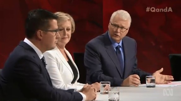 Tony Jones leads panellists Triggs and Zed Seselja through the difficult discussion.