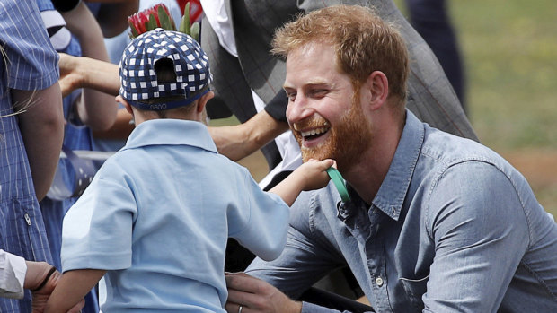 From cuddling kids to climbing the Harbour Bridge, what shone was Prince Harry's character. 