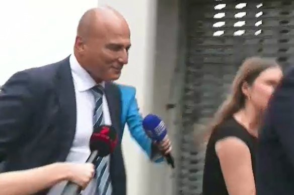 Surgeon Reza Adib arrived at Southport Police Station a day after his home was raided by police.