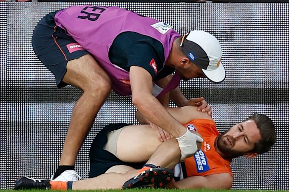 Callan Ward in agony after injuring his knee. It’s since been confirmed as an ACL.