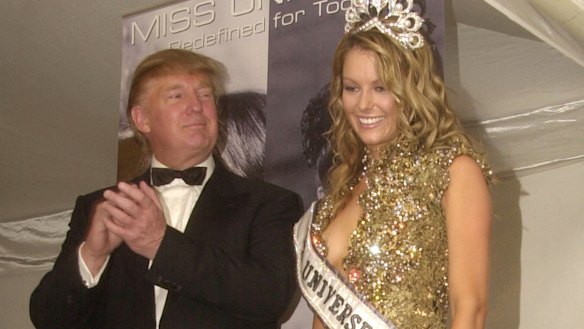 Former Miss Universe owner Donald Trump with pageant winner Jennifer Hawkins in 2004.