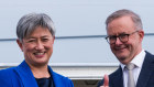 Prime Minister Anthony Albanese and Foreign Minister Penny Wong board a plane for the Quad meeting. 