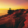 smh traveller august 24 cover story. Couple on rocks at Gantheaume Point, Broome, Western Australia. CREDIT GETTY IMAGES