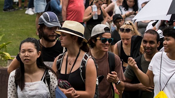 People line up to enter Mrs Macquarie's Chair in preparation for New Year's Eve in Sydney on Monday.