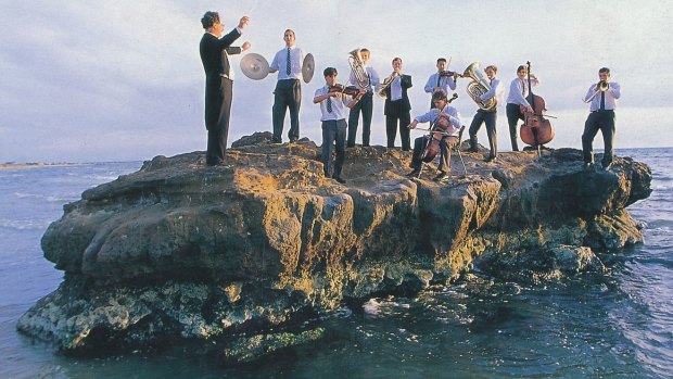 Rock music: Lewis Plumridge leads students from Mentone Grammar in a rehearsal for Jesus Christ Superstar on Seagull Rock, Mentone, in February 1998.