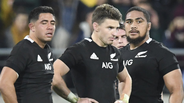 Stalemate: New Zealand's Anton Lienert-Brown,  Beauden Barrett and Angus Ta'avao show their disappointment at the 16-all draw against South Africa.