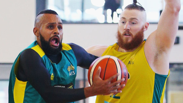 NBA stars Patty Mills and Aron Baynes in Boomers practice.