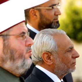 Muslim leaders including Grand Mufti Ibrahim Abu Mohamed (centre) at an interfaith meeting in 2014.