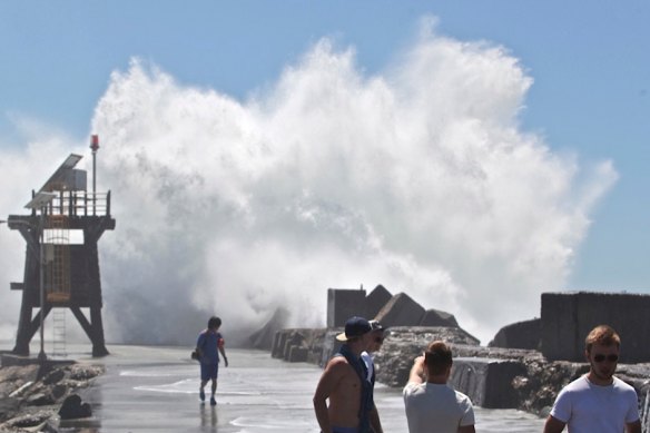 A monster wave in January 2015 that washed a woman off Nobbys breakwall in Newcastle.