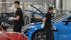 Xiaomi’s SU7 electric vehicles on the floor at the company’s production facility in Beijing, China.