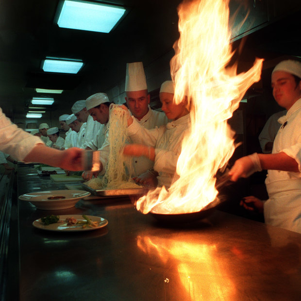 The Age caught apprentice chef George Calombaris learning how to flambe salmon at the Sofitel in 1997.