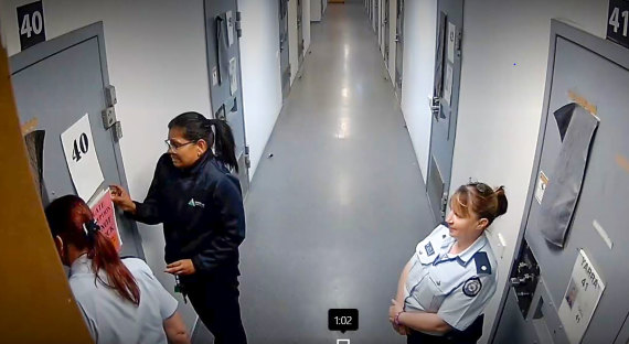 Prison CCTV shows Tracey Brown, far right, attending Nelson’s prison cell alongside nurse Atheana George about 1.30am the day of Nelson’s death.
