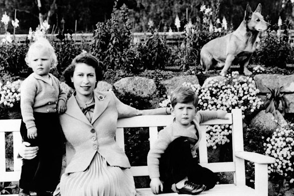 The late Queen Elizabeth with her children Charles, now the King, and Princess Anne, in 1953.