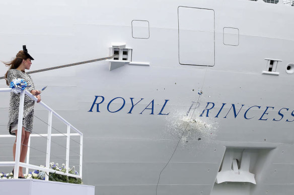 Princess Catherine, then known as the duchess of Cambridge, does the honours during the ceremonial bottle smash for the Royal Princess in 2013.