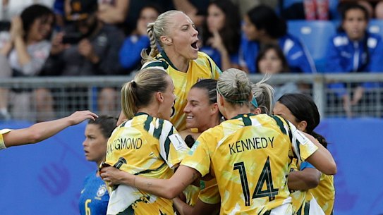 Australia's players celebrate after Chloe Logarzo scored their side's second goal.