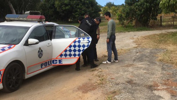 Two suspected asylum seekers were detained by police on the banks of the Daintree River.