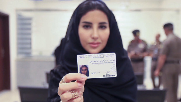 Esraa Albuti, an executive director at Ernst & Young in Saudi Arabia, displays her brand new driver's licence in June 2018.
