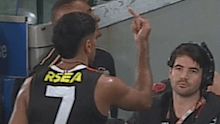 Nasiah Wanganeen-Milera giving the middle finger to fans.