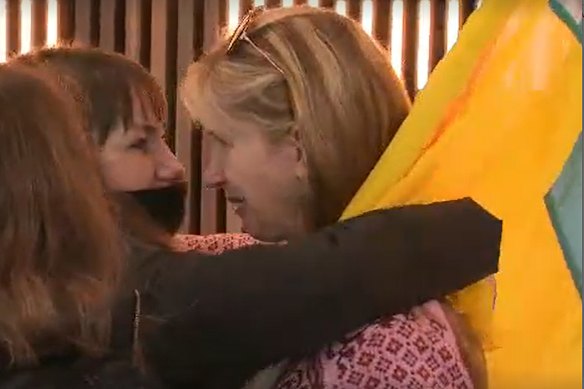 The emotional moment Ms Balvan and Ms Kmetj wrapped their arms around one another.