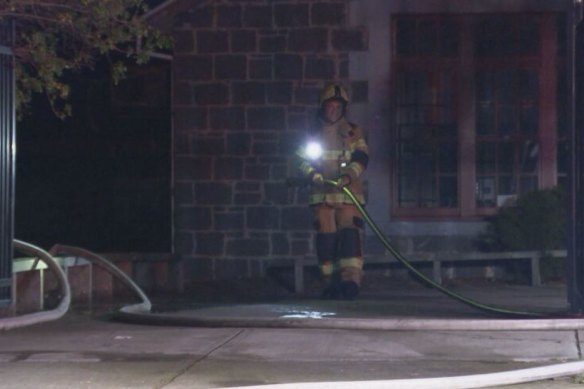 A firefighter at the scene overnight.