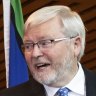 Former Prime Minister Kevin Rudd (right) during the unveiling of his official portrait by Ralph Heimans (left), at Parliament House in Canberra. 