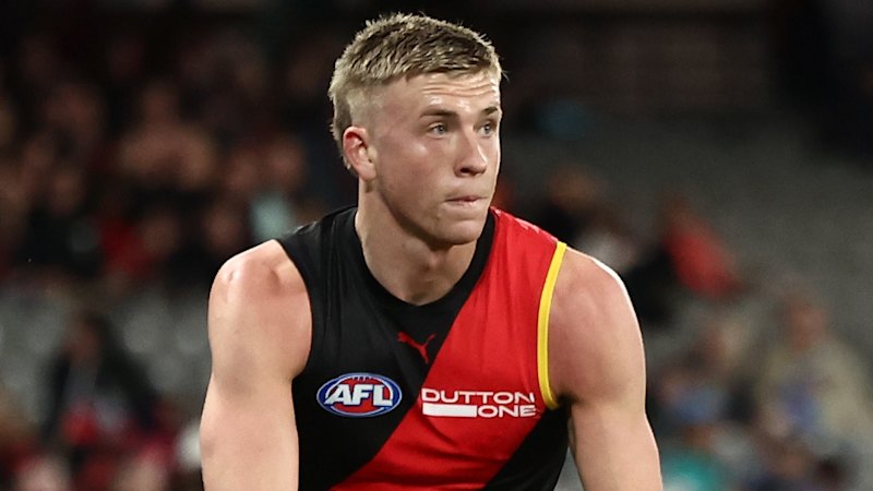 Essendon’s Caddy sent to hospital; Gold Coast crash and burn as Bulldogs win
