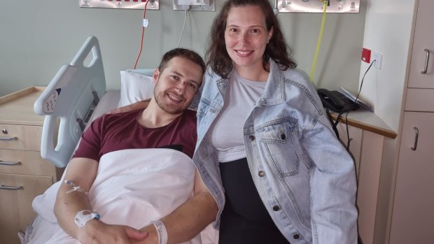 Constable Randall Kirk with wife Breanna in hospital.