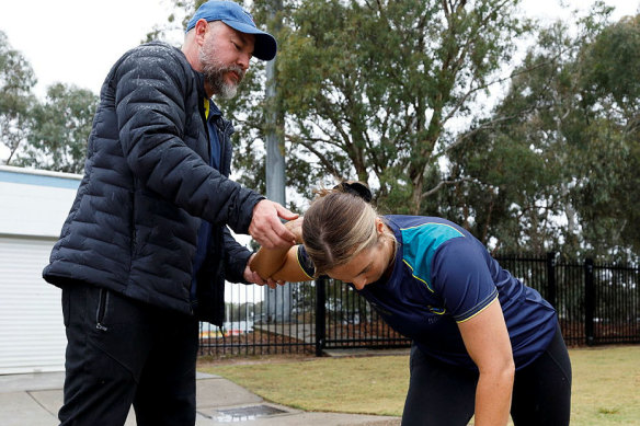Laura Reynell receives shot put coaching from Tony Sten at the Warrior Games 2024 Team Australia training camp in Canberra.