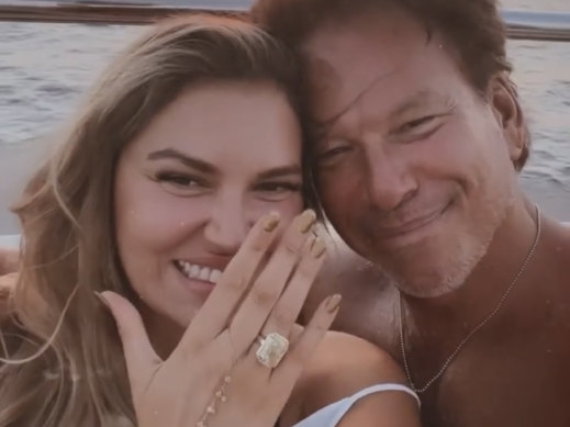 Bella Hunter shows off her engagement ring last August after saying yes to billionaire Gary Friedman.
