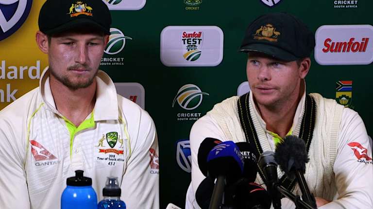 Cameron Bancroft and Steve Smith face the media in Cape Town.