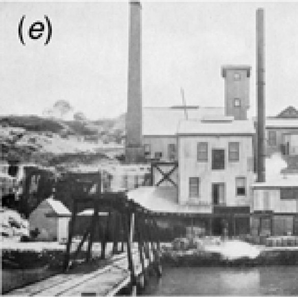 Historical photo showing the uranium refinery on Fern Bay, near the future Nelson Parade.