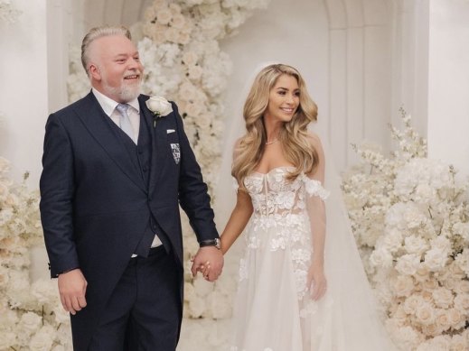 Kyle Sandilands and Tegan Kynaston wore some of the $150,000 in flowers at their wedding last Saturday.