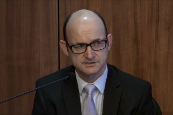 Victoria Police's head of legal services Fin McRae gives evidence on Thursday.