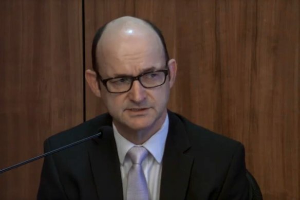 Victoria Police's head of legal services, Findlay McRae, gives evidence at the royal commission