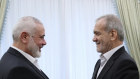 President Masoud Pezeshkian, right, shakes hands with Hamas chief Ismail Haniyeh at the start of their meeting at the President’s office in Tehran on Tuesday.