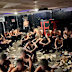 Two 20-year-olds were arrested after police were called to the scene of an alleged hazing incident where over two dozen young men were partially clothed and covered in liquids in America.