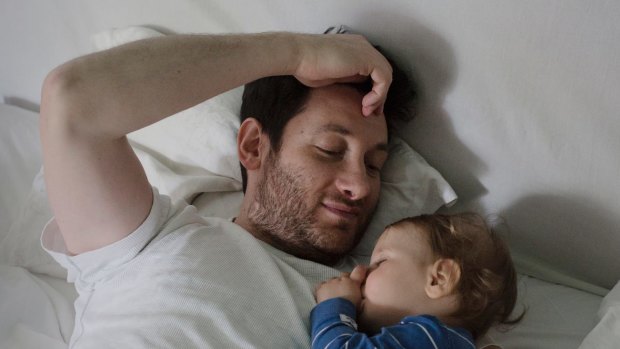 Arts programmer Murat Saglamoglu, 34, on paternity leave with Oskar.