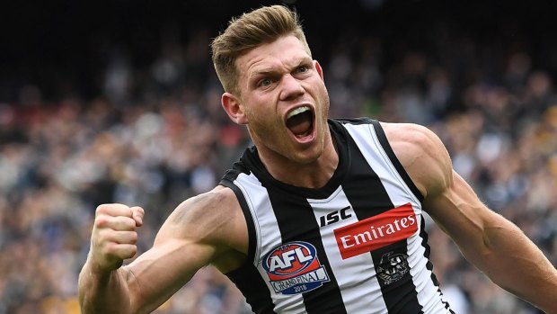 Taylor Adams of the Magpies reacts after kicking a goal during the 2018 AFL Grand Final.