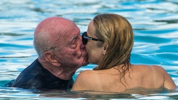 Kissing in the Caribbean: Rupert Murdoch and Jerry Hall lock lips in Barbados.