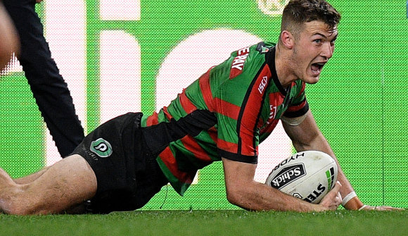 Magic Rabbit: Souths winger Campbell Graham crosses for the match-winning try on Friday night.
