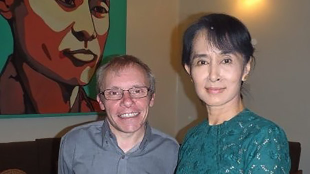 Sean Turnell, left, has long provided advice to Myanmar’s elected leader Aung San Suu Kyi, right. 