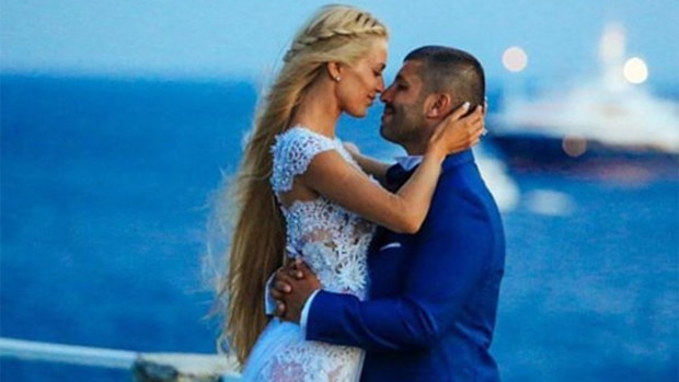 John Macris and his wife Victoria Karyda on their wedding day in Mykonos.