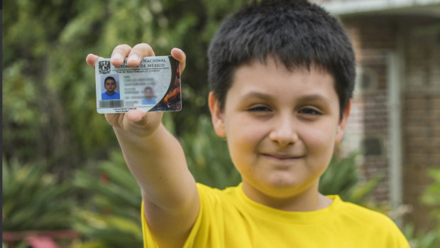 Carlos Santamaria Diaz shows his university identification card, in Cuernavaca, Mexico. 