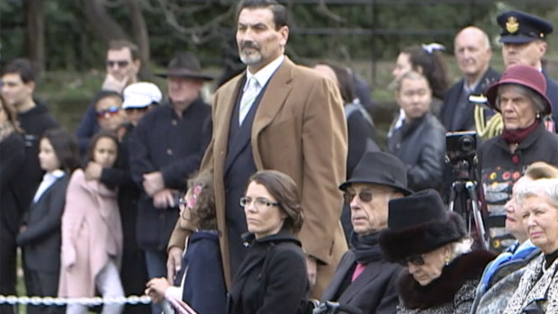 Riccardo Bosi (standing) and his wife Rhiannon Bosi (seated).