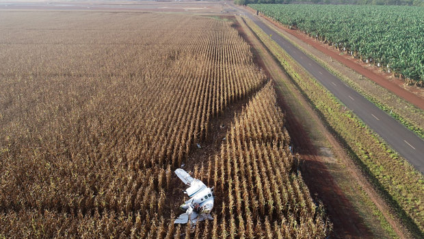 The wreckage of the light plane showing its initial impact point at the edge of the cornfield.