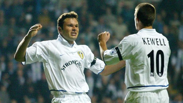 Mark Viduka celebrates with Harry Kewell during their time together at Leeds.