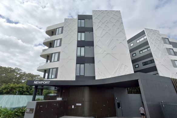 A body was found at the Newport Hamilton Apartments in Brisbane on Monday.