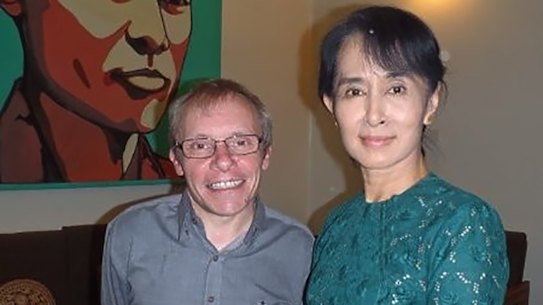 Sean Turnell, left, has long provided advice to Myanmar’s elected leader Aung San Suu Kyi, right. 